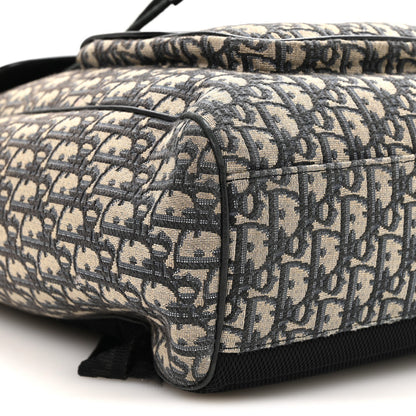 Oblique Jacquard Grained Calfskin Drawstring Saddle Backpack Beige Black