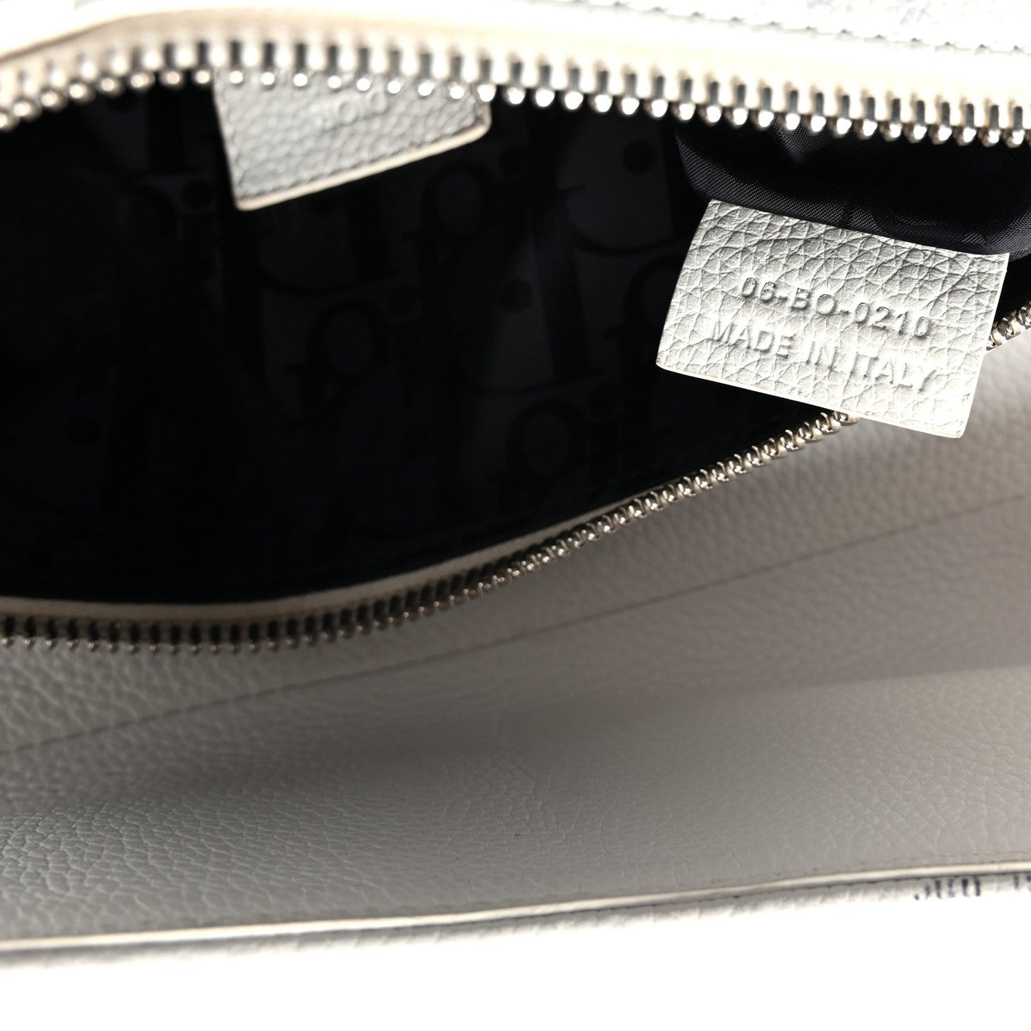 X Daniel Arsham Grained Calfskin Newspaper Print Saddle Bag White