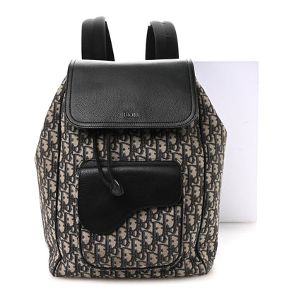 Oblique Jacquard Grained Calfskin Drawstring Saddle Backpack Beige Black