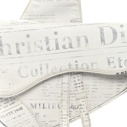 X Daniel Arsham Grained Calfskin Newspaper Print Saddle Bag White