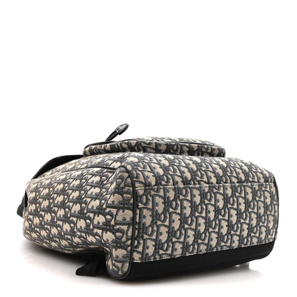 Oblique Jacquard Grained Calfskin Drawstring Saddle Backpack Beige Black