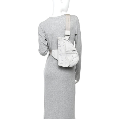 X Daniel Arsham Grained Calfskin Newspaper Print Saddle Bag White